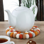 Cilio Fair Trade Virgin Sheep Wool Trivet, Handcrafted in Nepal, 8.5-Inch Round, Orange/Gray