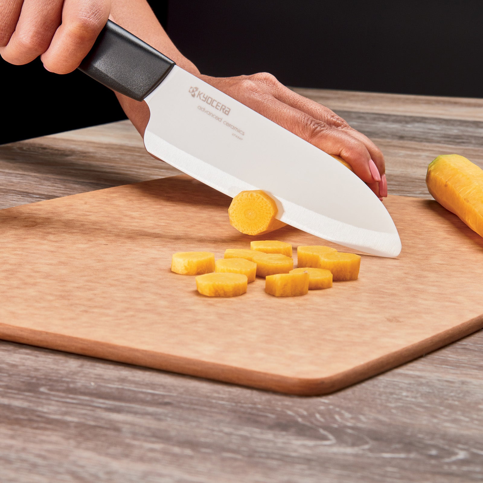 Kyocera Revolution Ceramic 5-1/2 Inch Santoku Knife, Black