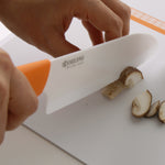Kyocera Revolution Ceramic 5-1/2 Inch Santoku Knife, Orange