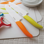 Kyocera Revolution Ceramic 5-1/2 Inch Santoku Knife, Orange