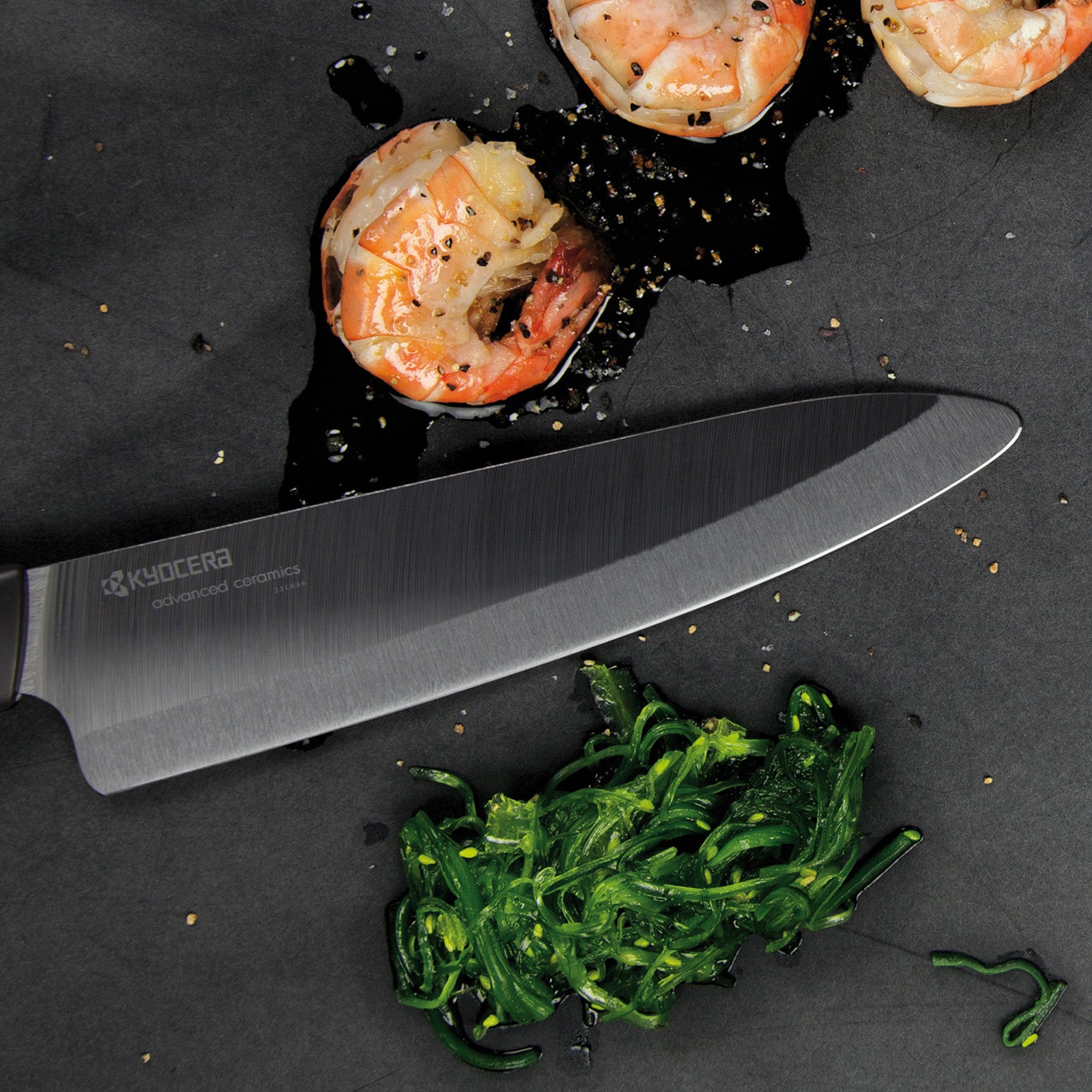 Kyocera Advanced Ceramics 3 Piece Revolution Series Knife Set with Black Blades