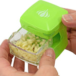 Kitchen Innovations Garlic-A-Peel Garlic Press, Crusher, Cutter, Mincer, and Storage Container, Green