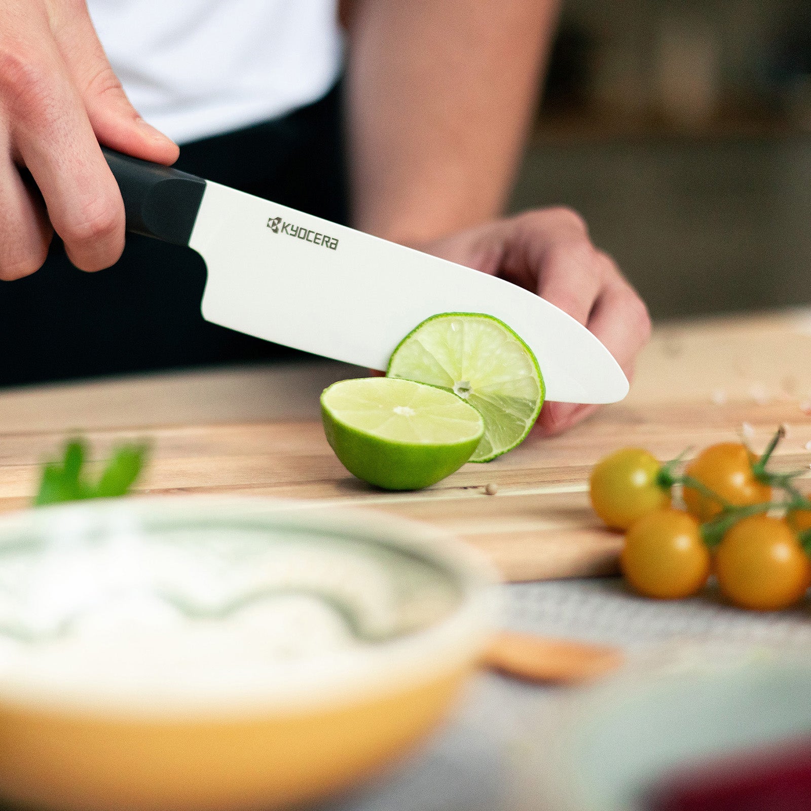 Kyocera INNOVATIONwhite® 5.5-Inch Ceramic Santoku Knife, White Blade with Non-Slip Black Handle