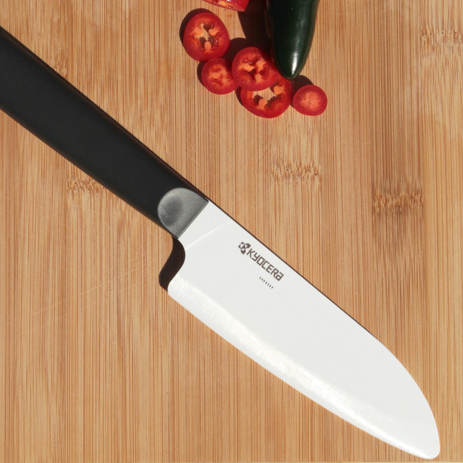 Kyocera INNOVATIONwhite® 6-Inch Ceramic Santoku Chef's Knife, White Blade with Non-Slip Black Handle