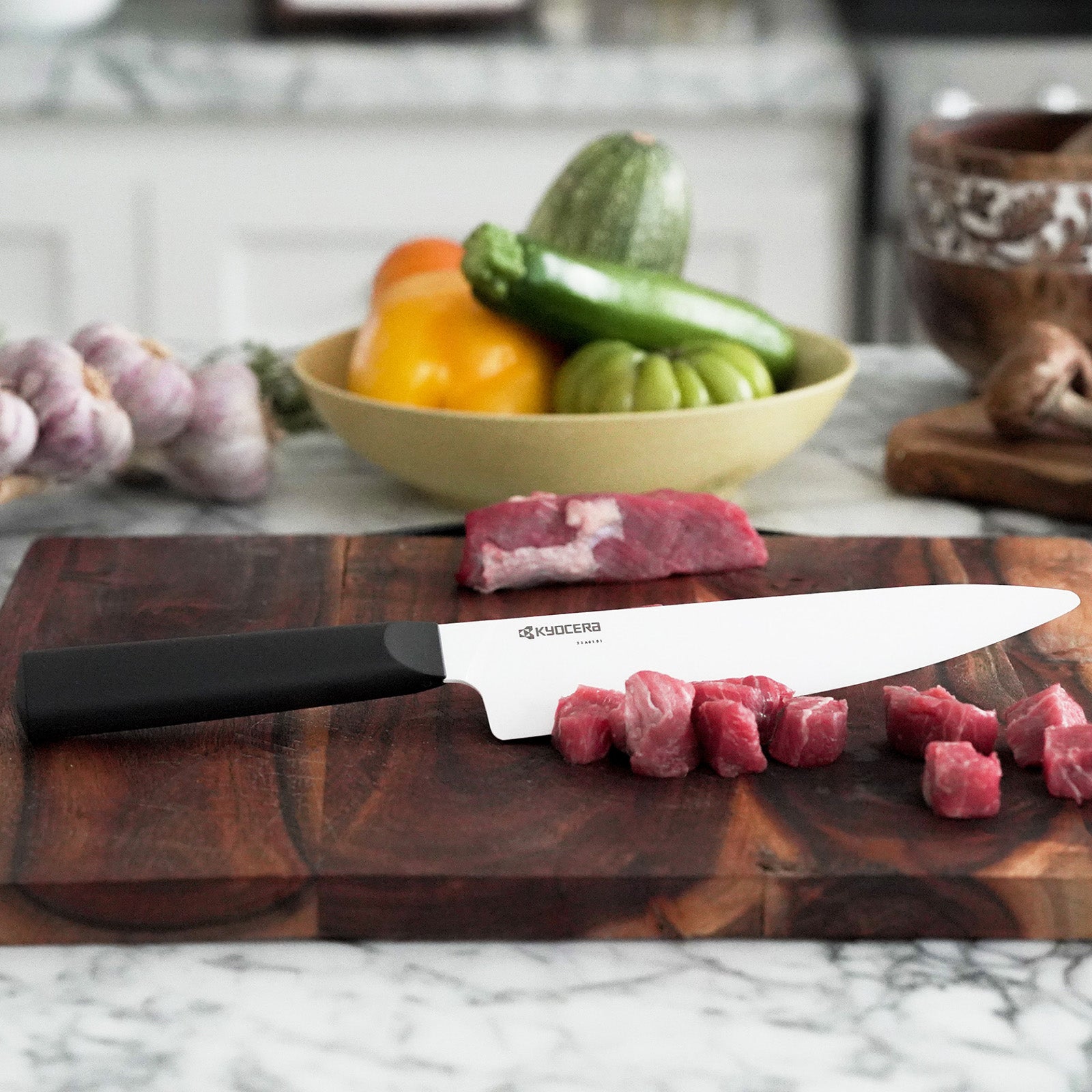 Kyocera INNOVATIONwhite® 7-Inch Ceramic Chef's Knife, White Blade with Non-Slip Black Handle