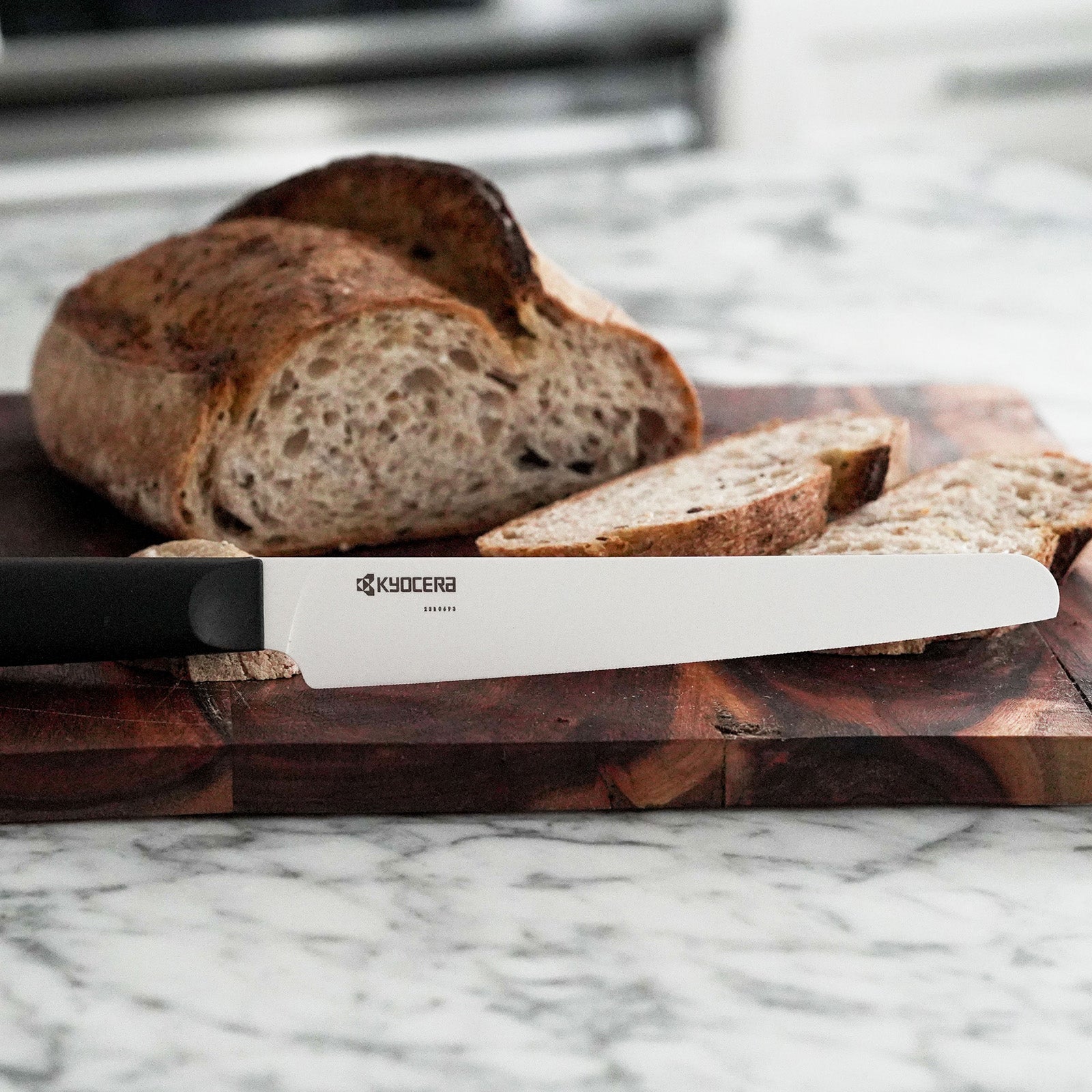Kyocera INNOVATIONwhite® 7-Inch Ceramic Bread Knife, White Micro Serrated Blade with Non-Slip Black Handle