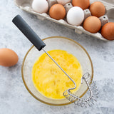Rada Cutlery Handi-Stir Whisk with Spring Face, Black Handle