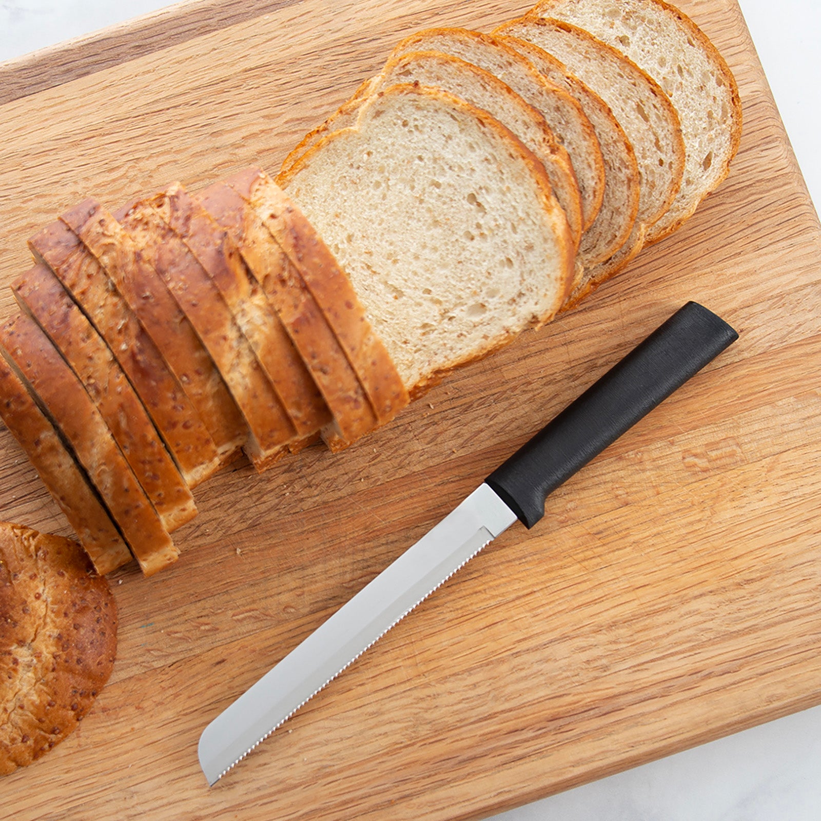 Rada Cutlery 6-Inch Bread Knife Stainless Steel Serrated Blade, Black Handle
